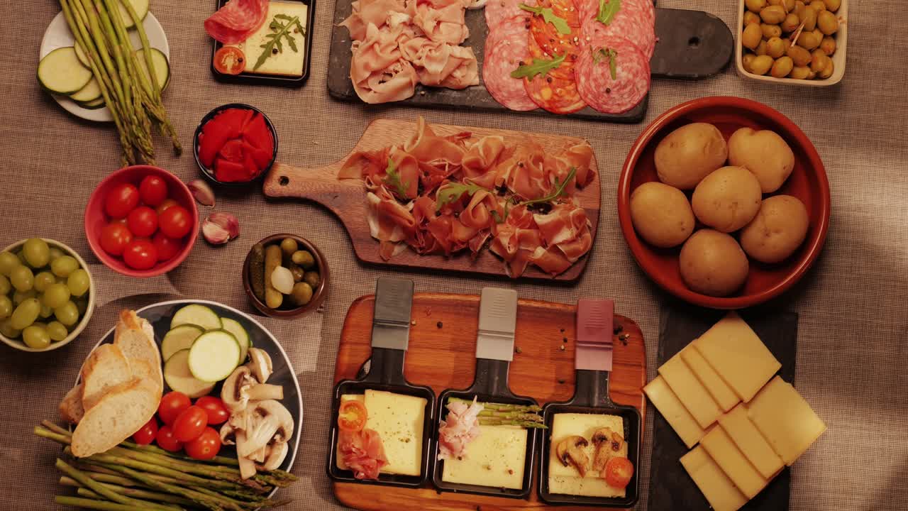 Italian or Spanish restaurant with traditional tapas food, Spanish cuisine, delicious tapas and cheese plate, bruschetta with cheese, olives dry tomatoes and tasty sandwich bar appetizer, buffet