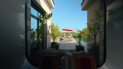 slow dolly shot showing a private pool with sun loungers beside in a villa