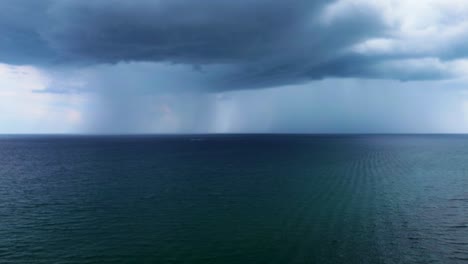 a stormy day at the beach along the atlantic ocean in south florida.
