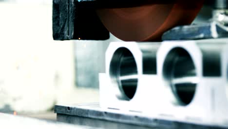 Finishing metal working on high precision grinding machine in workshop