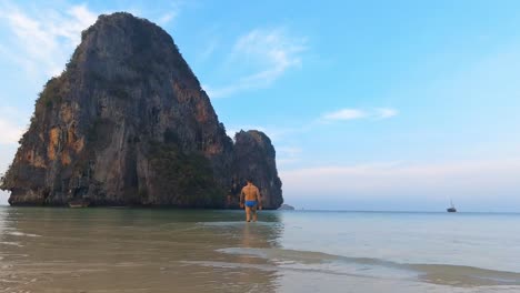 entering the water at phra nang beach