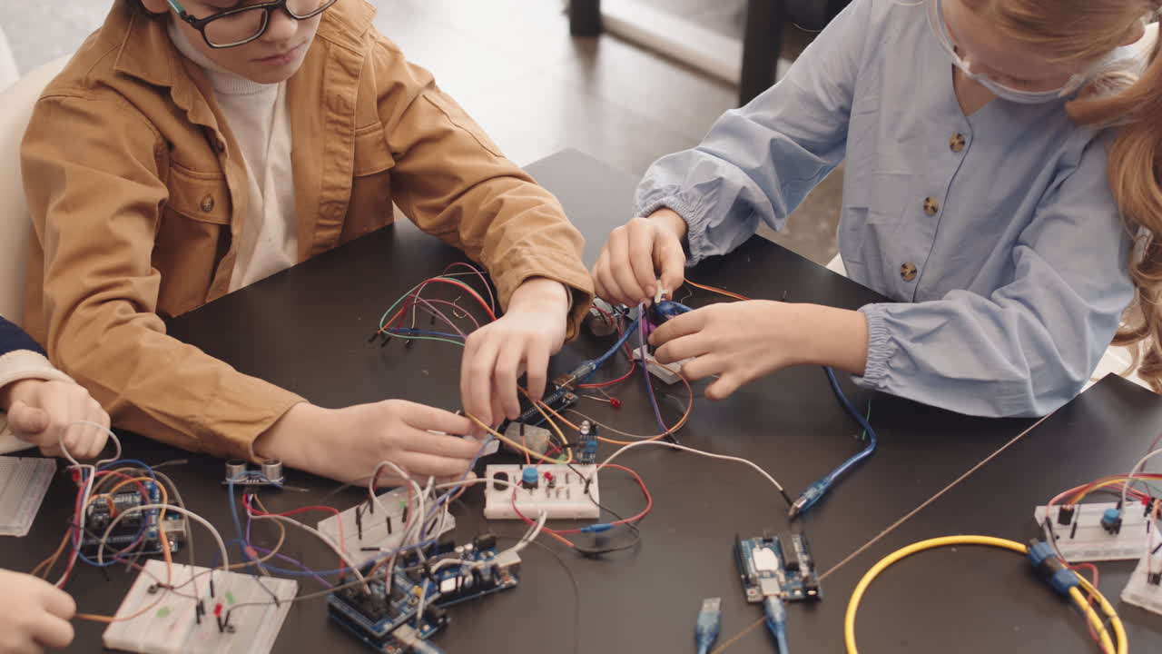 Children Learning Electronics and Robotics in a STEM Workshop