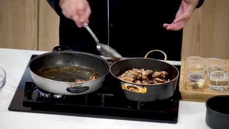 chef prepares delicious seared meat on the stovetop, showcasing effective cooking techniques and ensuring perfect doneness. the setup includes utensils, pans, and ingredients.