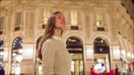 woman in galleria vittorio emanuele ii at night