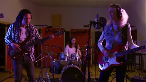 music group playing in a music studio