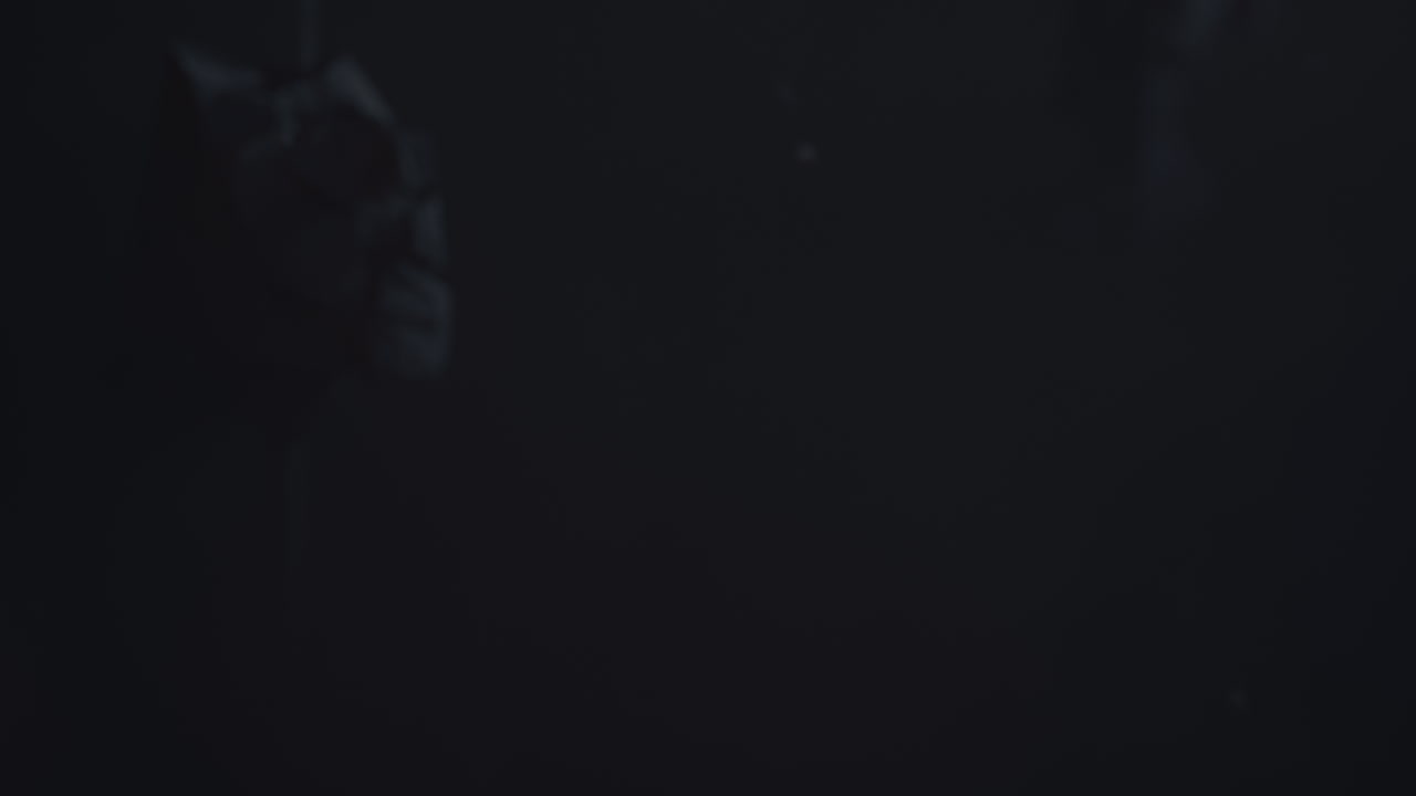 Crushed android heads on spikes in hell