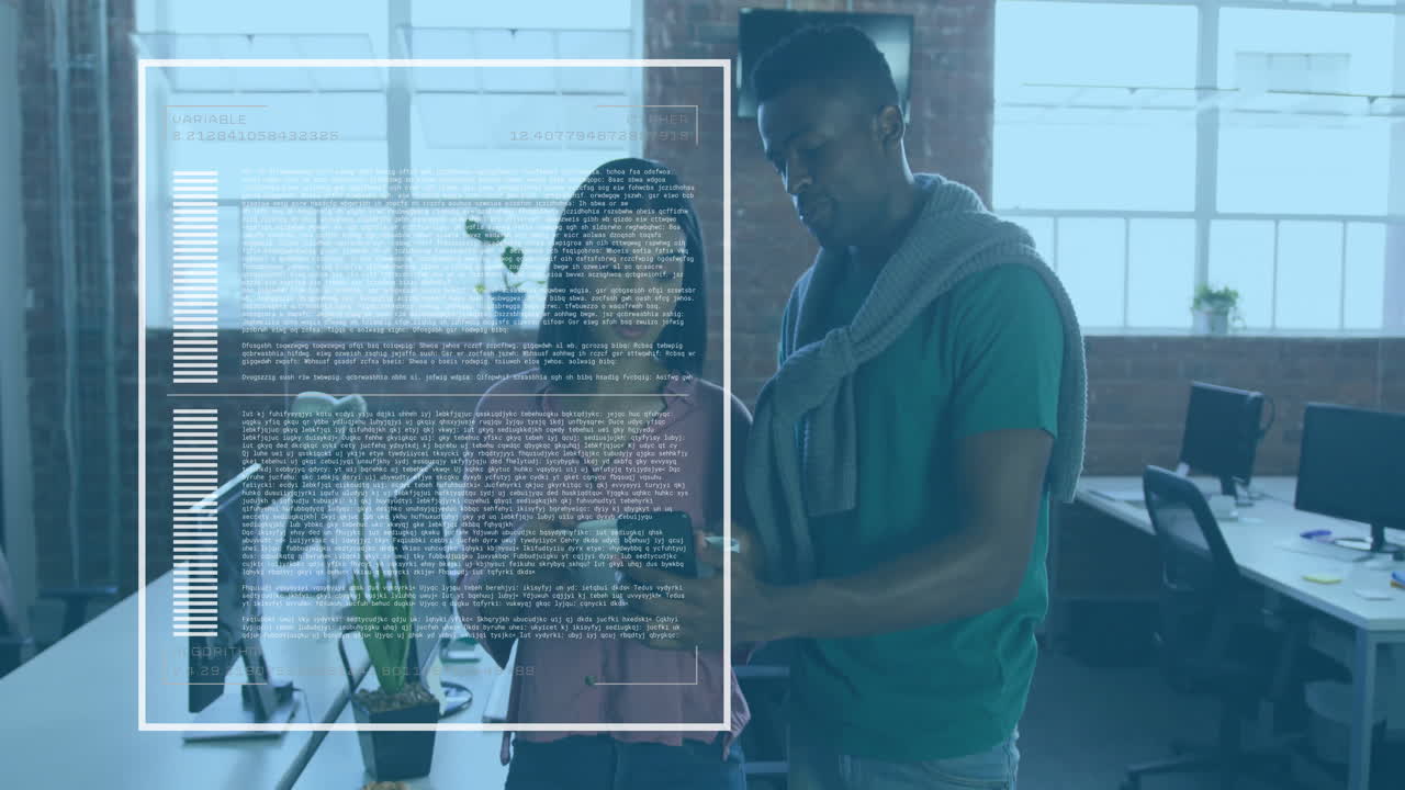 Woman holding tablet and man leaning at desks, exploring digital UI overlay with data analytics