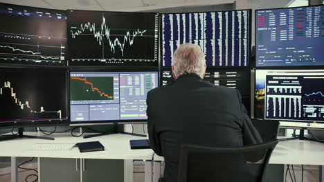 stock trader analyzing financial data