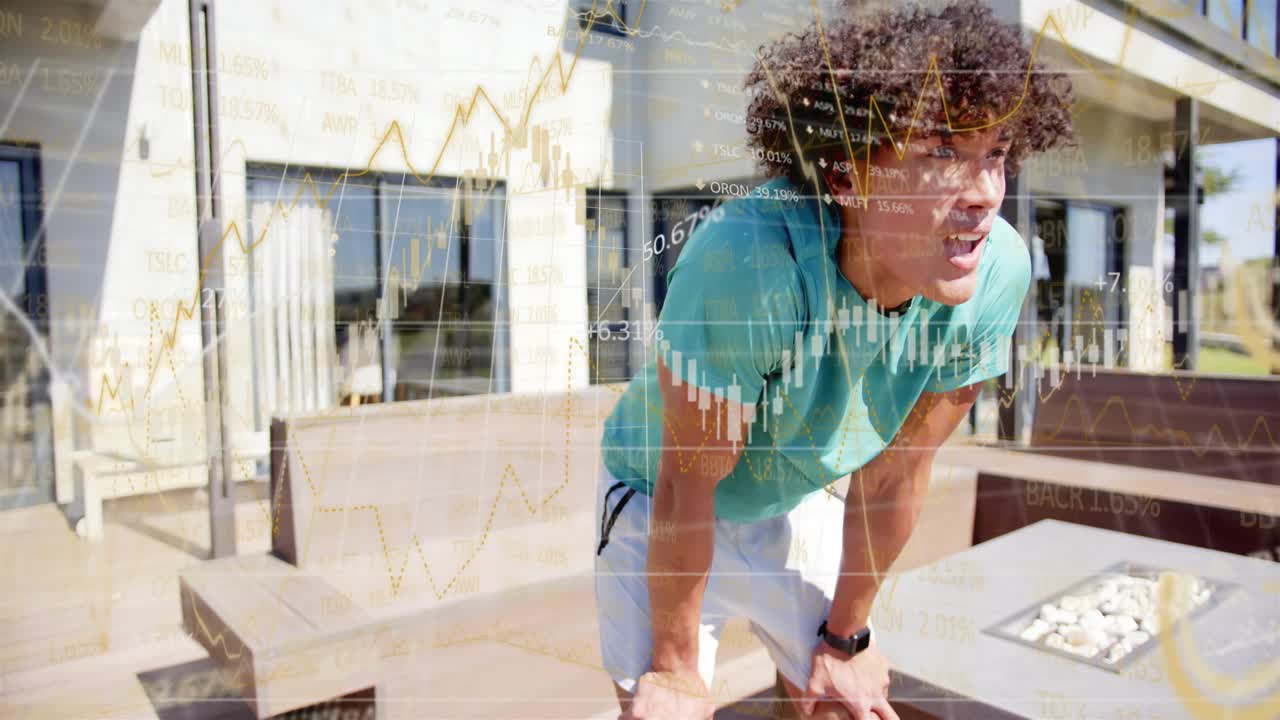 Man recovering post-workout leaning on knees and scanning deck while finance charts overlaying man