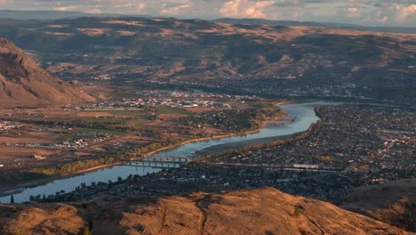 kamloops' twilight beauty: aerial panorama with semi-arid desert and the winding thompson river