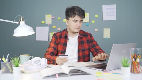 male student doing e-commerce shopping.