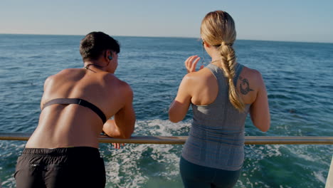 ocean, fitness and talking couple relax