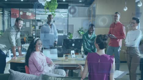 animation of circles, radars, globes over diverse female woman explaining strategy to coworkers