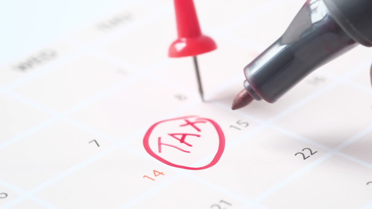 tax day concept with red circle on calendar date