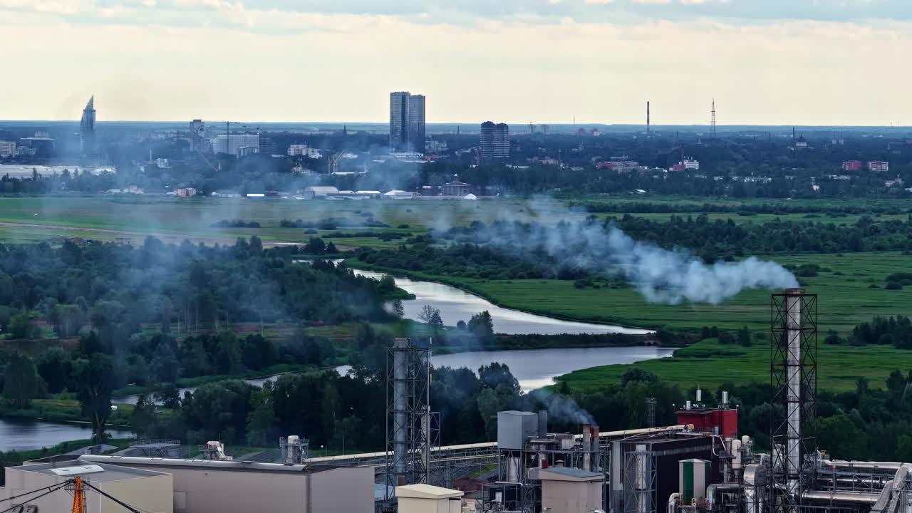 Smoke Coming Out From Industrial Plant Chimney. - aerial shot