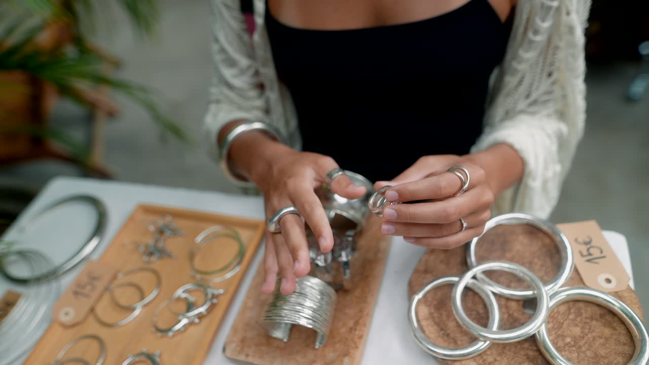 Woman Selling Handmade Silver Jewelry