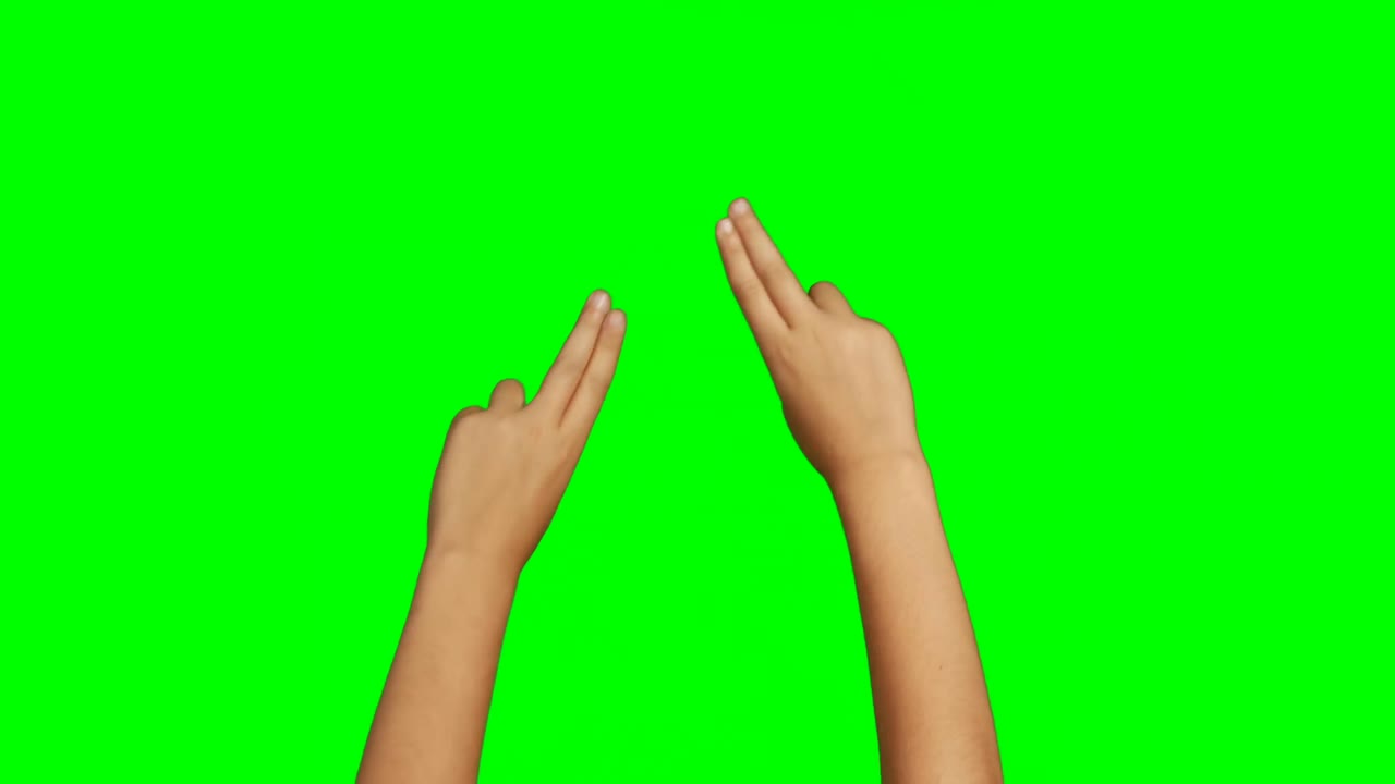 Persona che fa un gesto con la mano su sfondo green screen