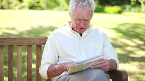 Retired-man-reading-a-newspaper-