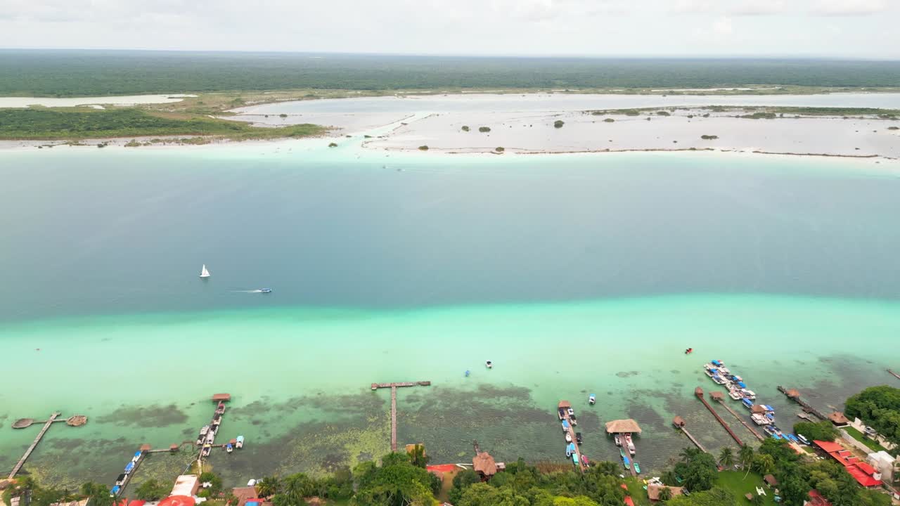 Casas And Villas With Private Piers Along The Lagoon Of Seven Colors In Bacalar, Mexico. Aerial Drone Shot