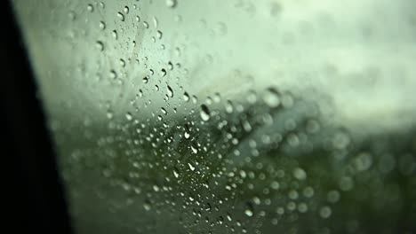 movement of rain falling on car side window