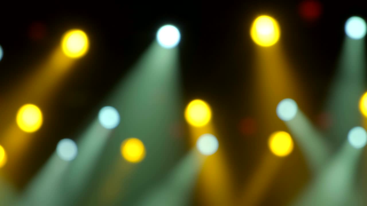 4k uhd handheld blur Defocused concert lighting during the performance Abstract lightning background.