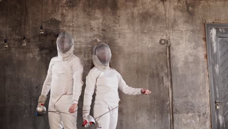 two fencers in action