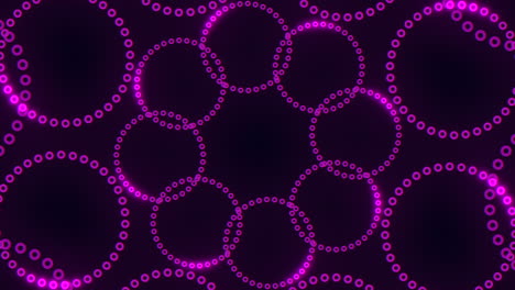 Neon-purple-circles-in-spiral-with-dots-on-black-gradient