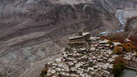 circling above ancient altit fort, november in hunza valley, pakistan