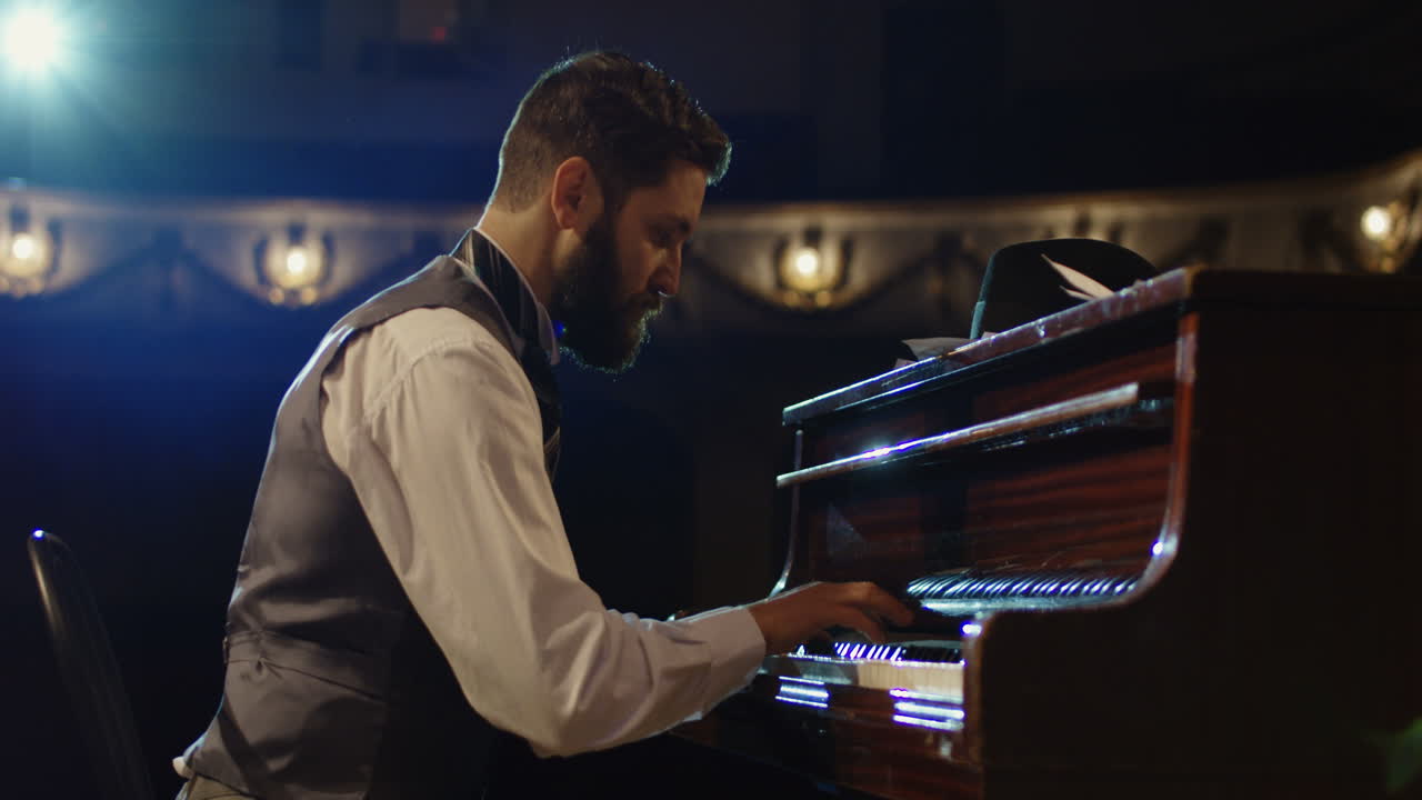 Man Playing Piano on Stage