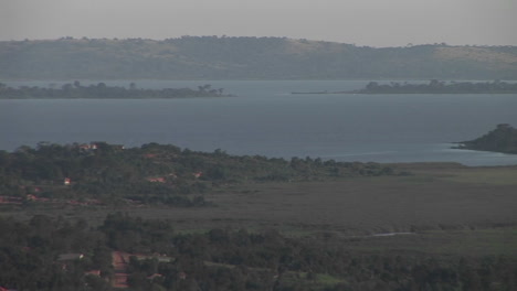 Mediumshot-of-Lake-Victoria-in-Uganda-under-a-light-haze