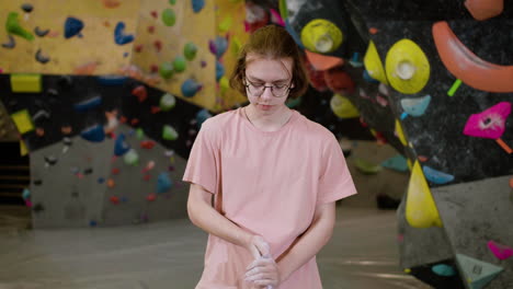 teenage boy in a climbing gym