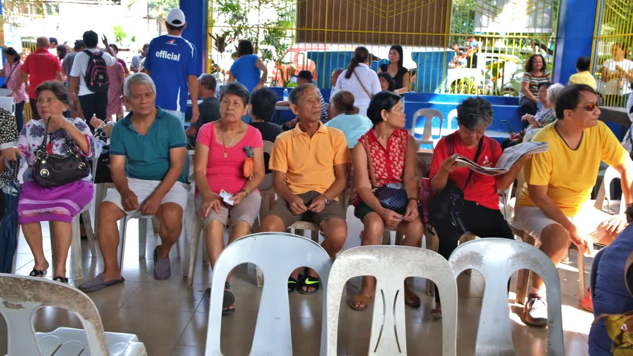 People Waiting in Line at an Election or Registration Center in the Philippines
