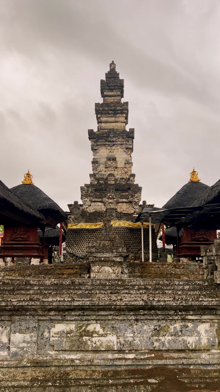 Ancient Bali Temple displaying exquisite stone carvings and sacred statues representing rich heritage and devotion providing a calm and sacred environment for spiritual connection