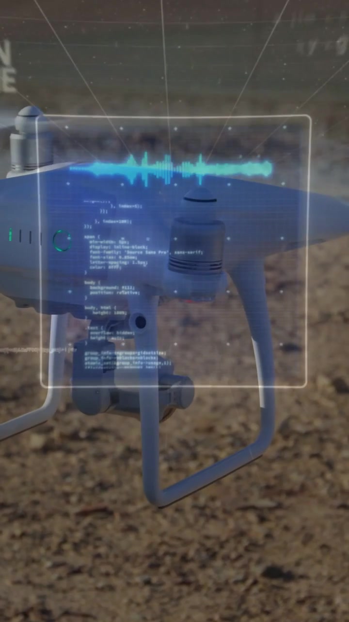 Vertical video: Drone hovering, system starting AR HUD with spinning reticle, wave code for mapping