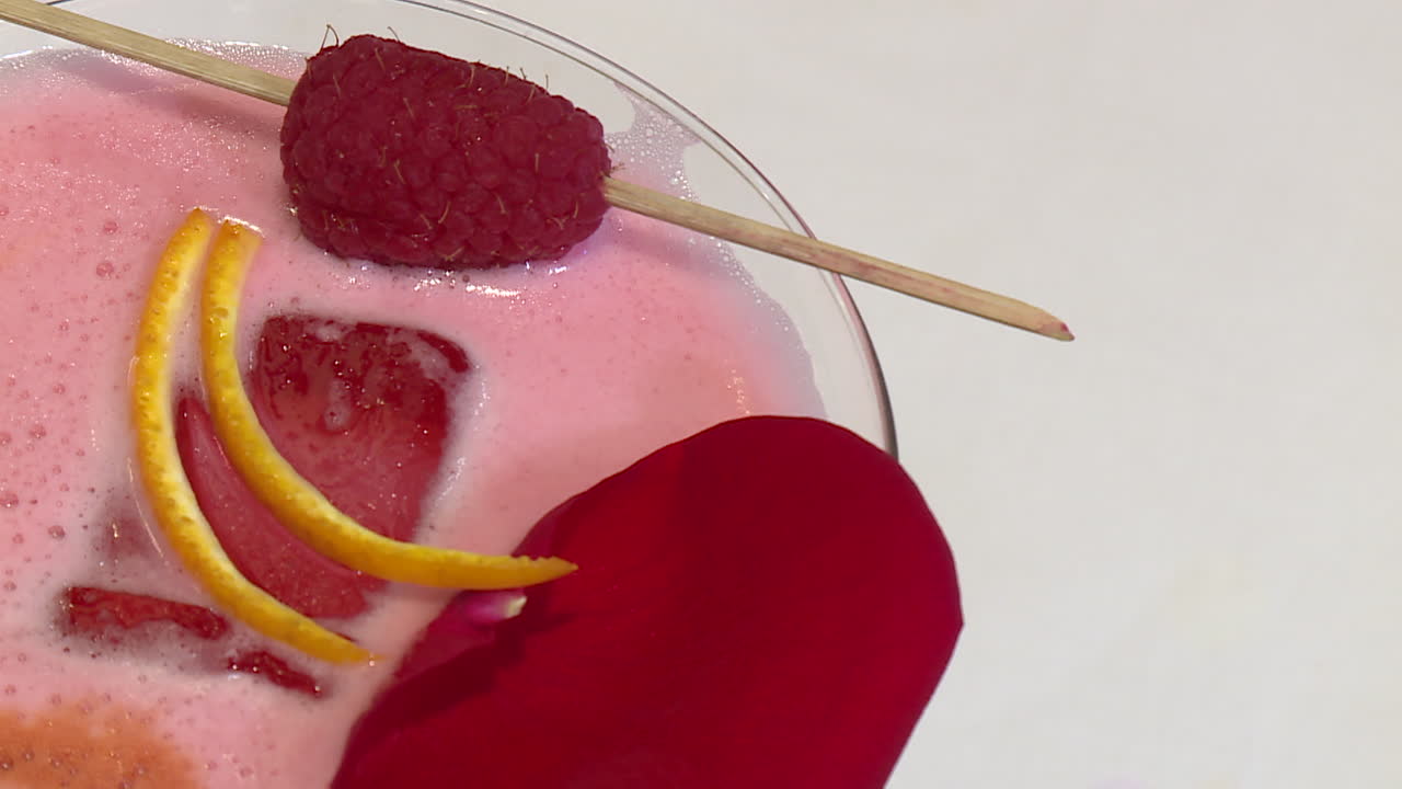 Pink Cocktail with Raspberry and Rose Petal