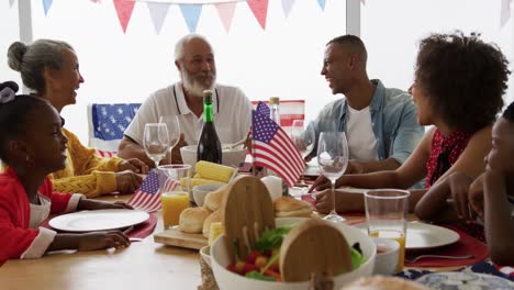 multi-generation family having celebration meal