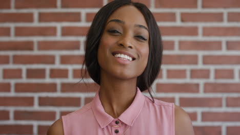 portrait attractive young african american woman smiling cheerful looking confident enjoying successful lifestyle independent black female slow motion close up