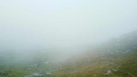 cinematic aerial drone flight with fog landscape in mountains