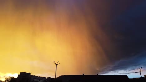 rain clouds with beautiful sunshine over the city of kazan, russia. motion shot
