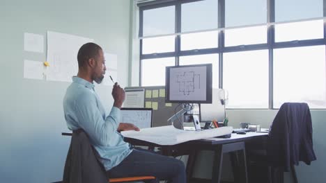 Thoughtful businessman in modern office