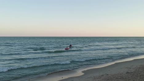 jet ski banana boat with tourists floating on the coastal shores, hua hin, thailand