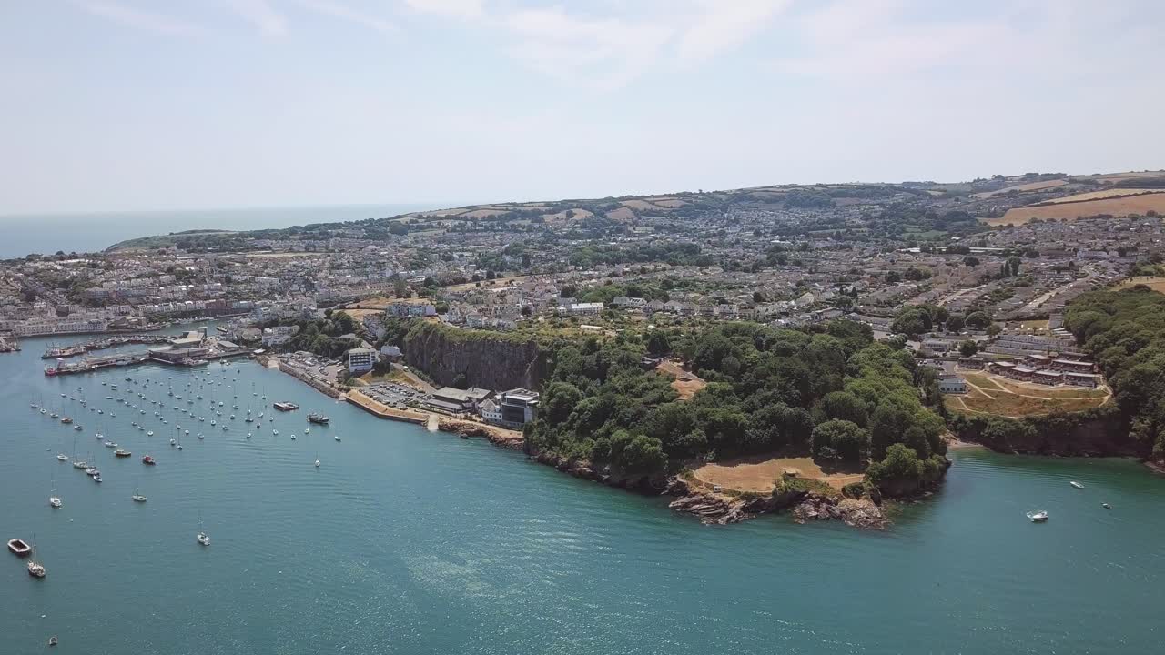 Aerial view of a coastal town and harbor
