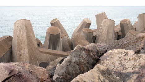 concrete formed maritime coastline defence geometric shape engineering on shoreline