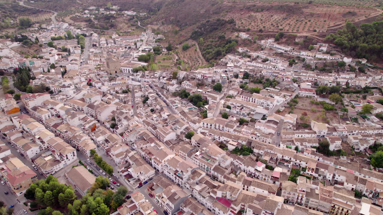 Aerial of white houses in the countryside of Spain, Montefrio