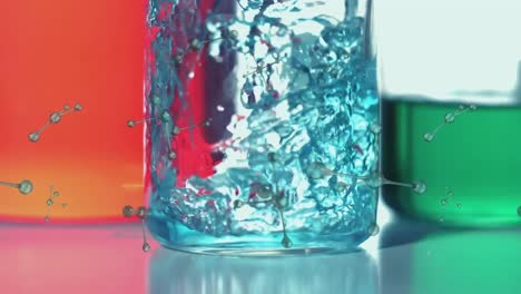 animation of molecules spinning over liquid pouring into laboratory beaker