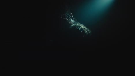 a creepy witch stands in the moody pose during the night storm