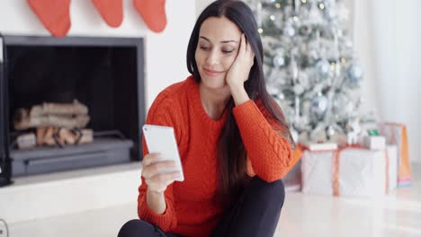 Young-woman-checking-out-her-text-messages