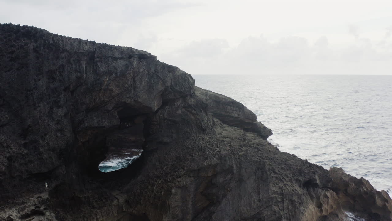 Massive Rock Formations At El Indio Cave In Atlantic Ocean Shoreline, Arecibo, Puerto Rico