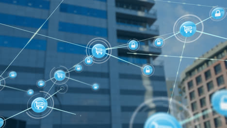 animación de una red de iconos digitales frente a la vista de edificios altos