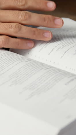 blind woman reading a braille book